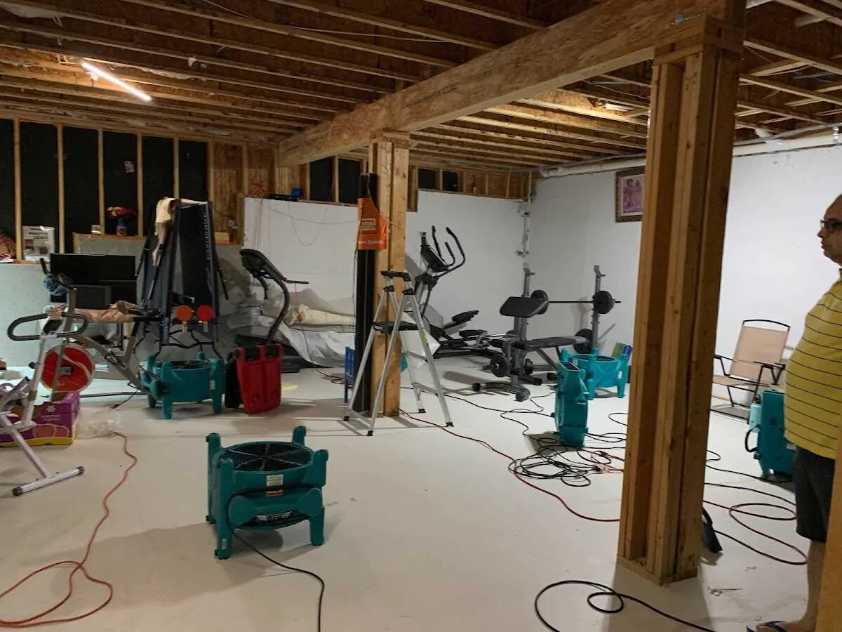 Basement drying equipment setup for Contents Cleaning & Restoration in Wahpeton